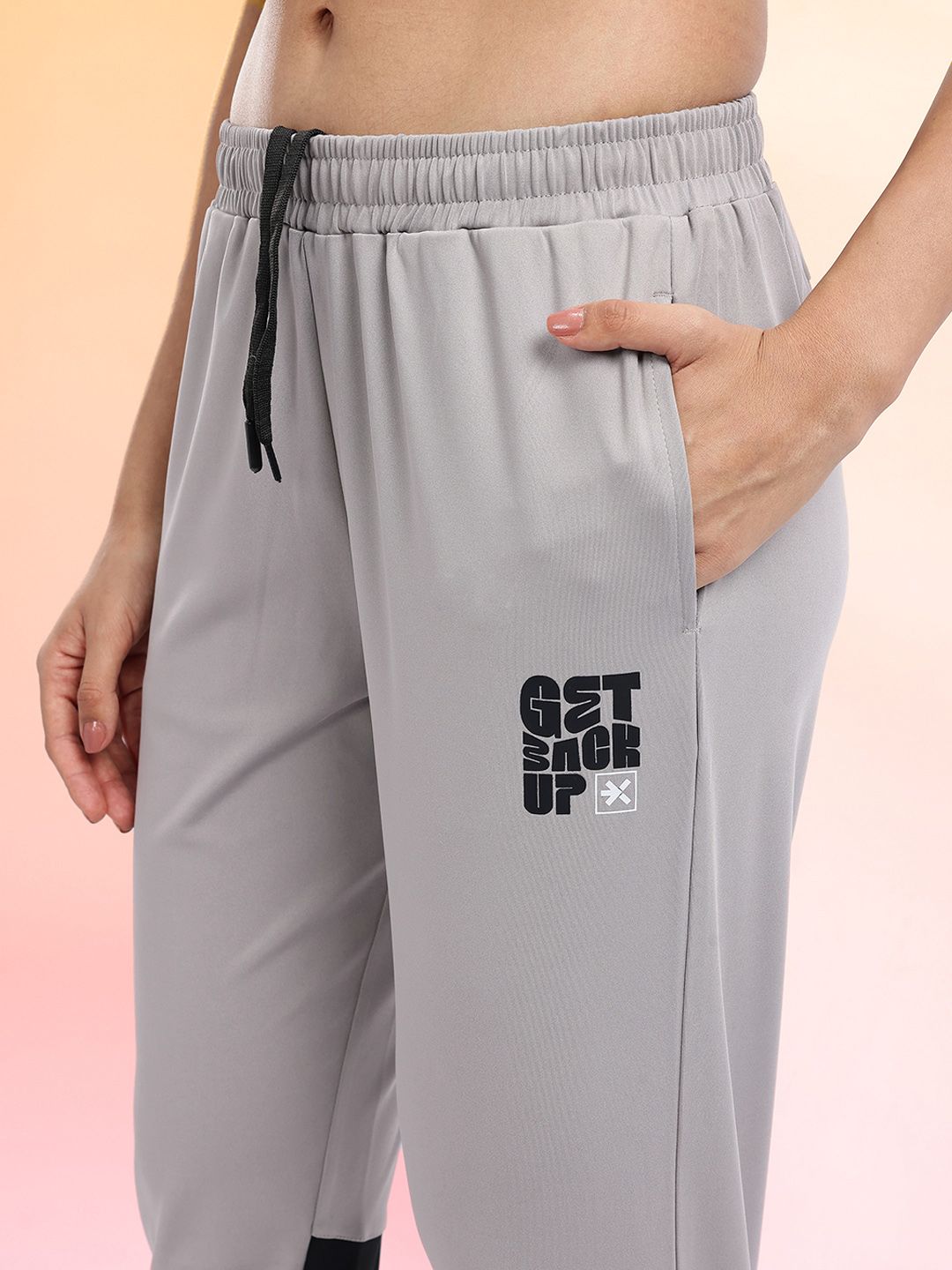 HRX by Hrithik Roshan Women Mid-Rise Rapid-Dry Running Track Pants with Side Slits