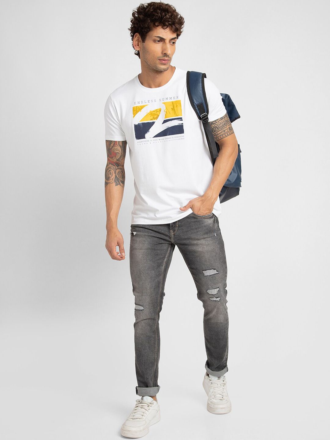 SPYKAR Men Slim Fit Low-Rise Mildly Distressed Heavy Fade Cotton Jeans