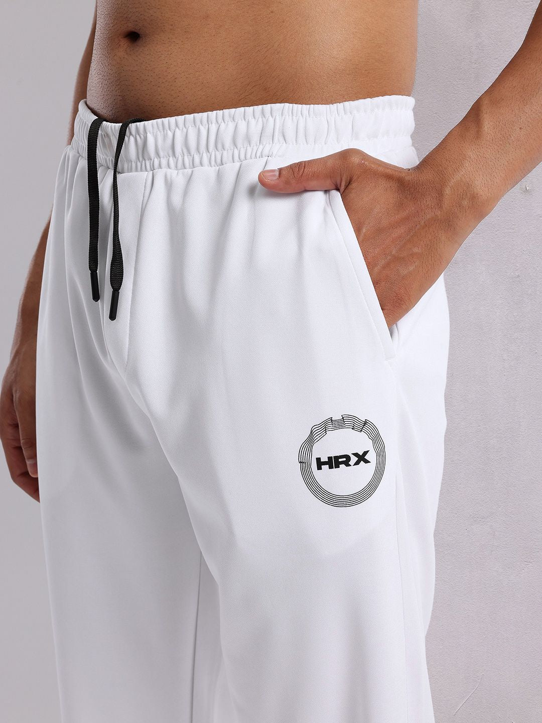 HRX by Hrithik Roshan Men Zipped Hem Rapid-Dry Running Track Pants