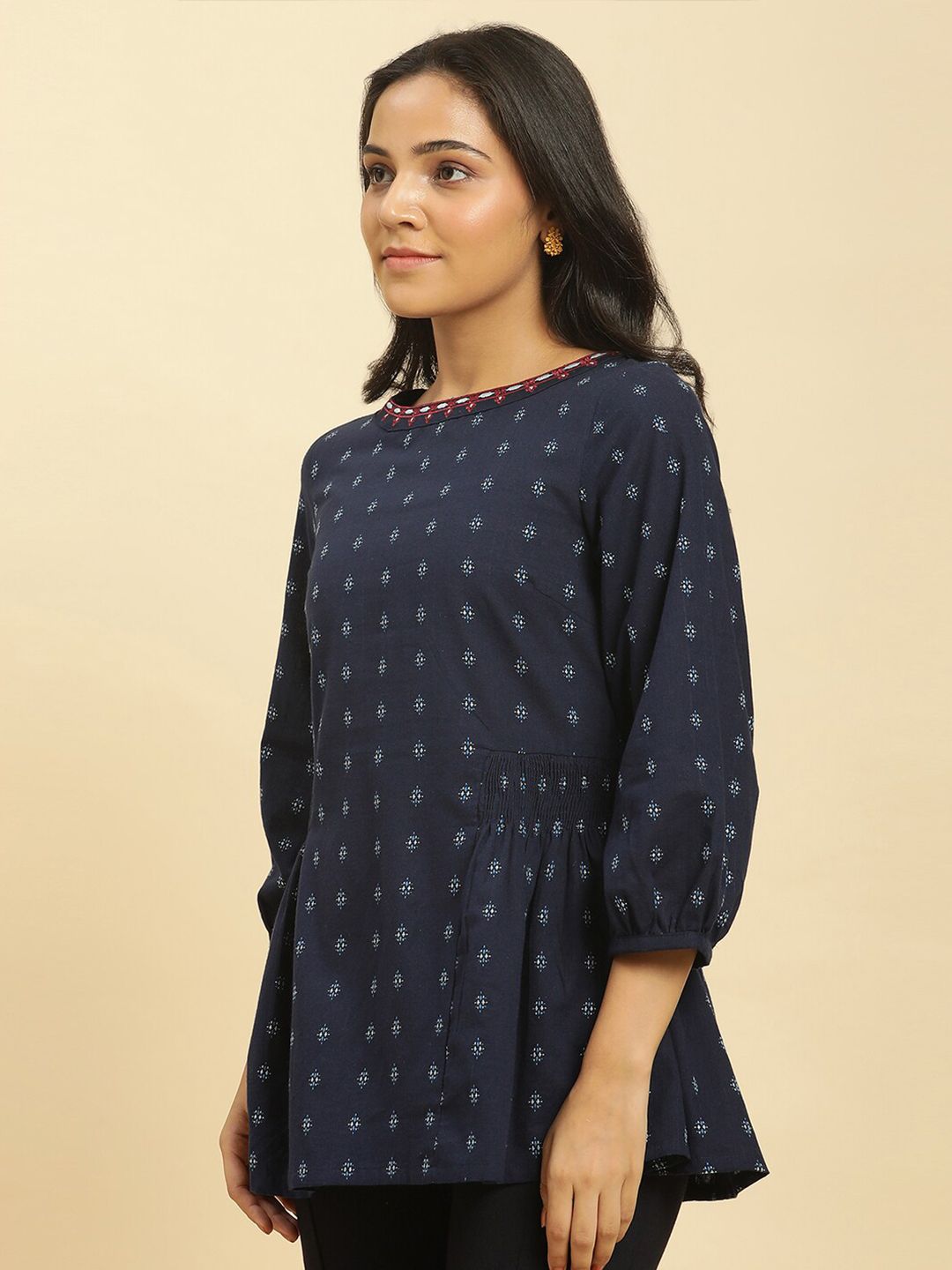 W Ethnic Motifs Printed Puff Sleeves Cotton Peplum Top