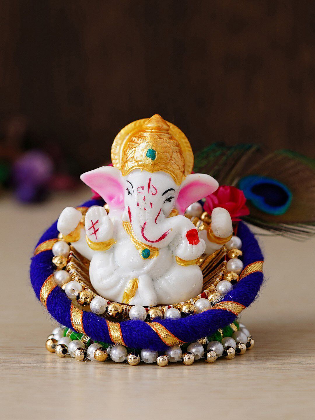 eCraftIndia Blue & White Handcrafted Lord Ganesha Idol on Floral Plate with Peacock Feather Decorative Showpiece