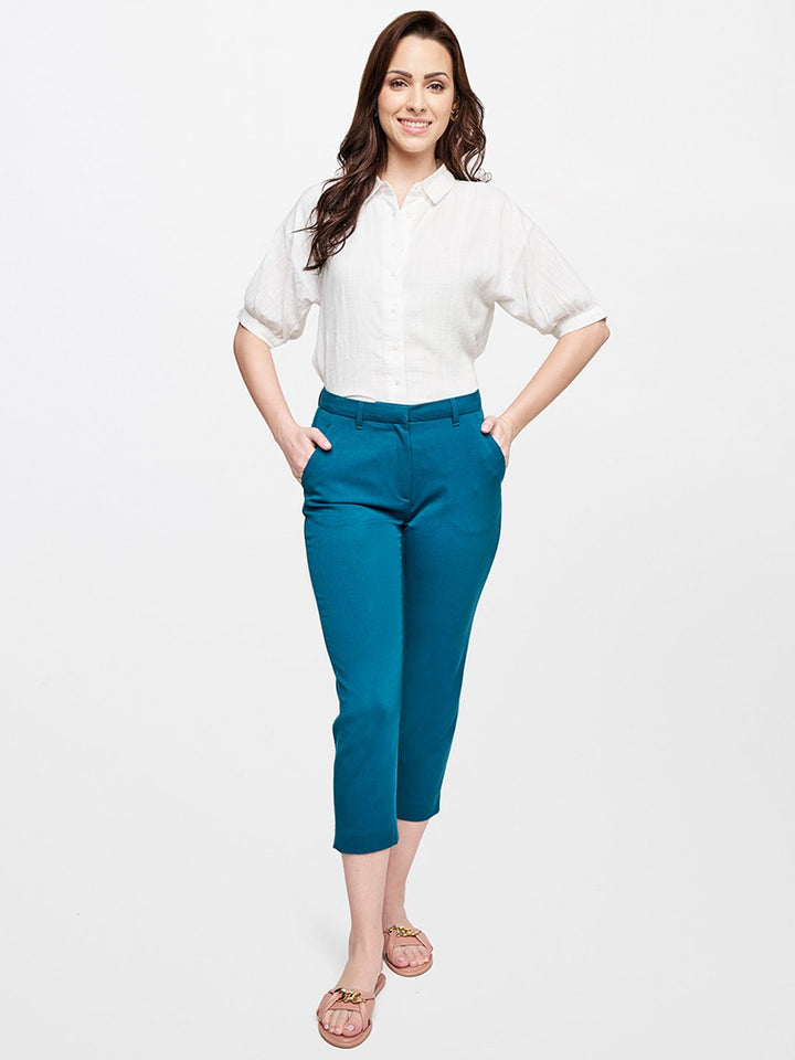 AND Women Teal Solid Casual Tapered Fit Trousers