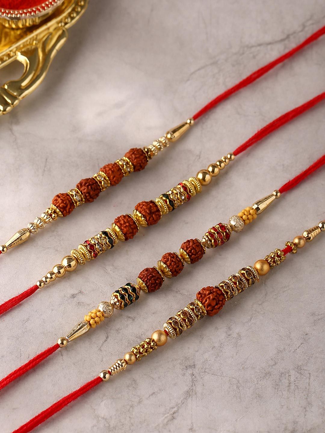 Voylla 4 Pcs Unisex Religious Rudraksha Rakhi Squad with Roli Chaawal Pack