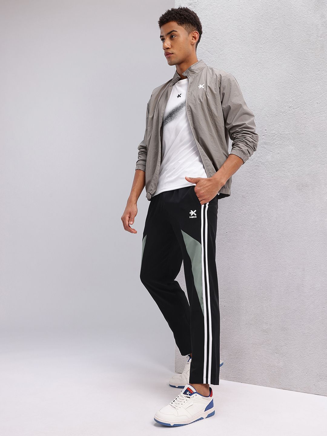 HRX by Hrithik Roshan Men Mid-Rise Colourblocked Lifestyle Track Pants with Side Stripes