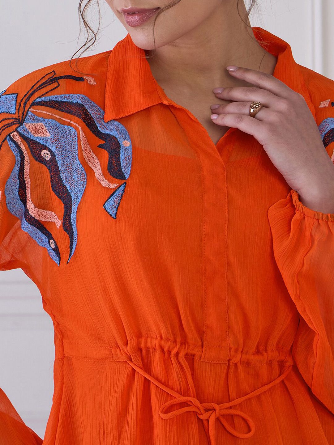 Antheaa Embroidered Floral Shirt Collar Extended Sleeves Semi Sheer Peplum Top