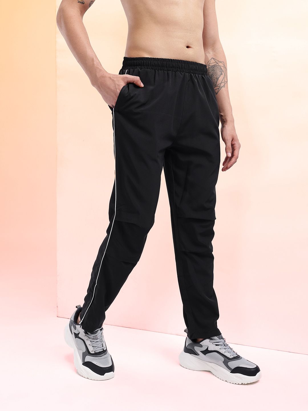 HRX by Hrithik Roshan Men Mid-Rise Rapid-Dry Training Track Pants with Side Slits