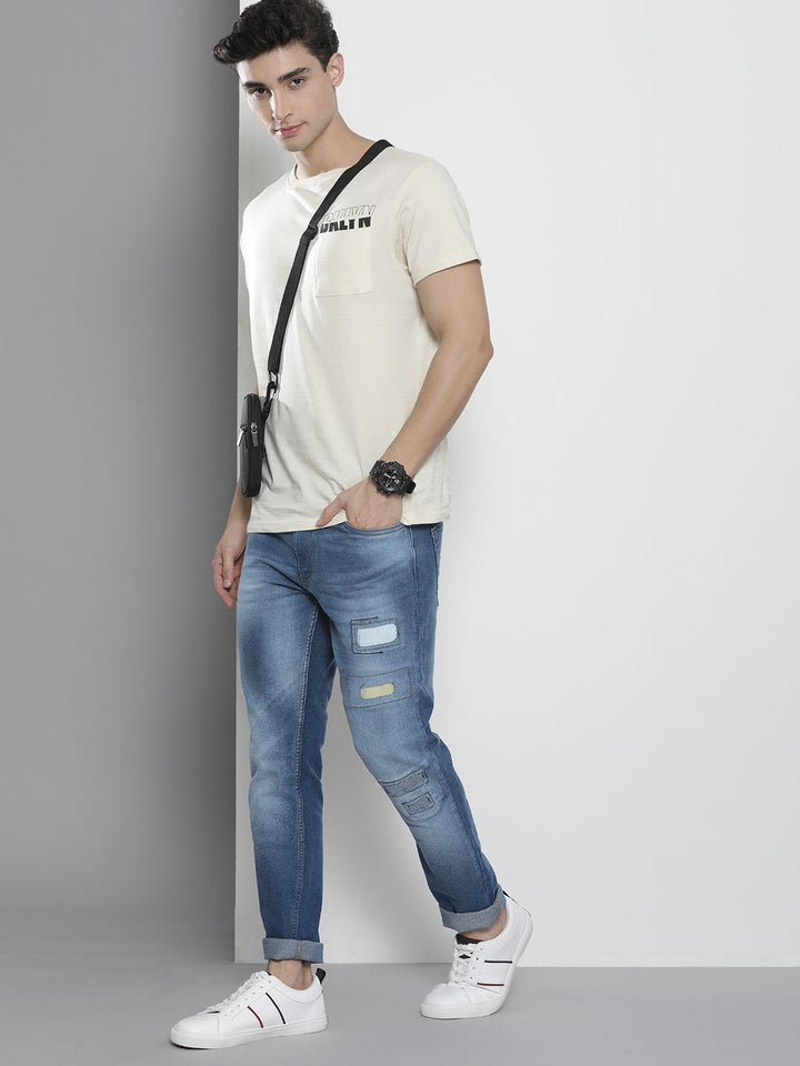 The Indian Garage Co Men Blue Mildly Distressed Heavy Fade Stretchable Jeans