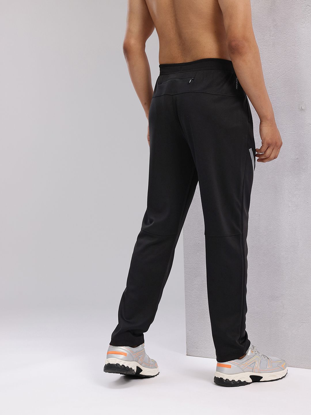 HRX by Hrithik Roshan Men Rapid-Dry Mid-Rise Regular Fit Running Track pants