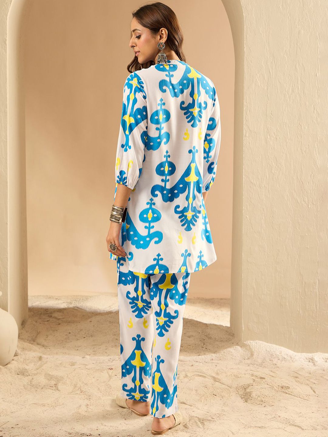Indo Era Women Printed Regular Kurta with Trousers