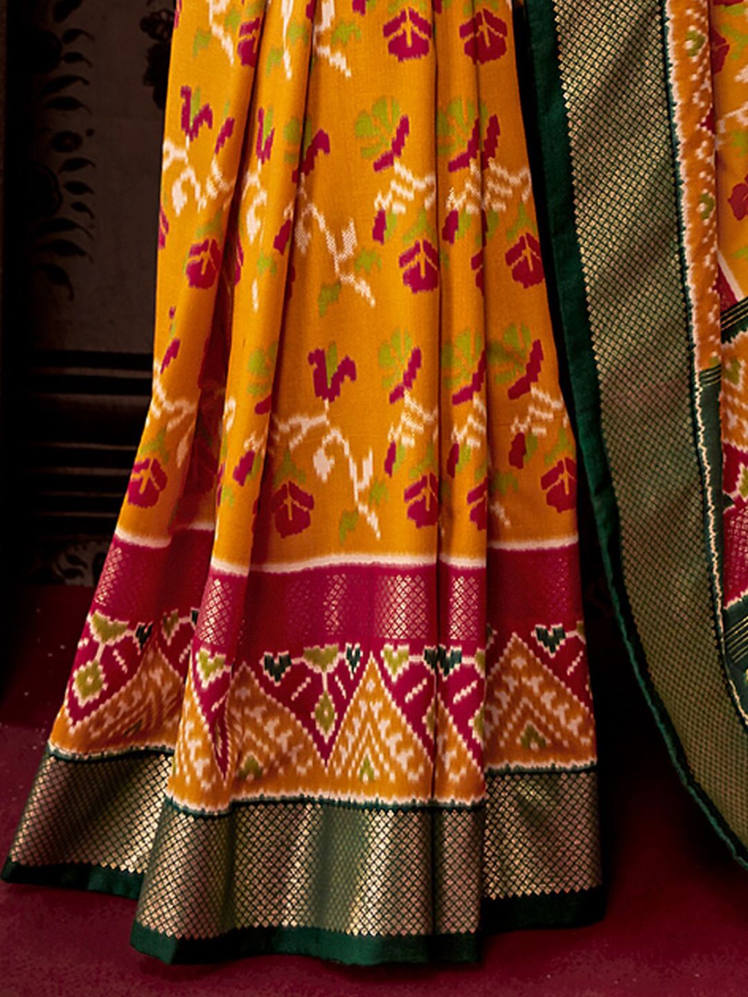 Saree mall Ethnic Motifs Printed Zari Patola Sarees