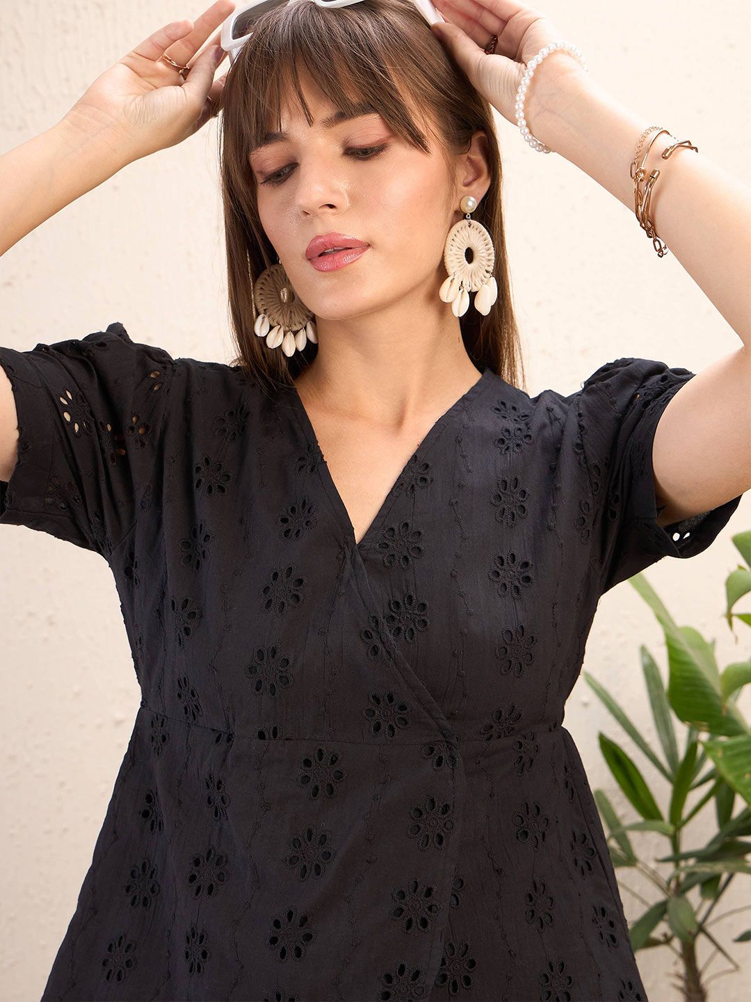 SASSAFRAS Black Self Design Schiffli Cotton Peplum Wrap Top