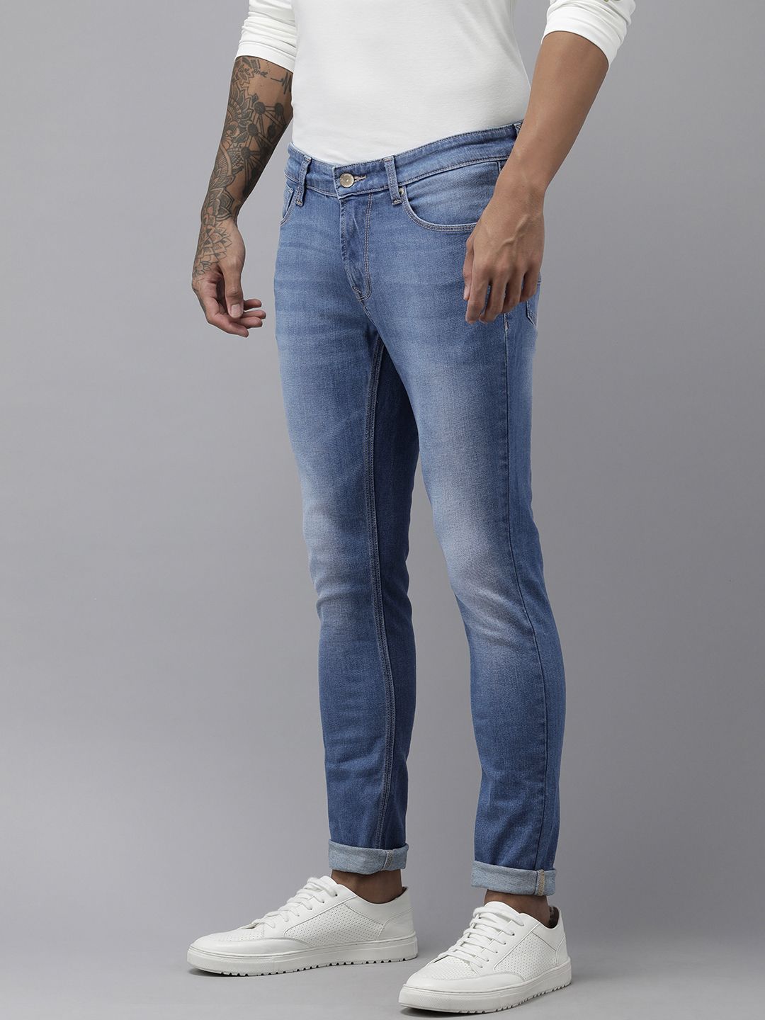 SPYKAR Men Blue Super Skinny Slim Fit Low-Rise Tapered Leg Light Fade Stretchable Jeans