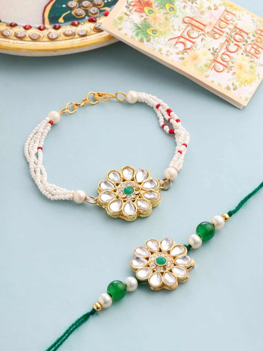 NVR Set of 2 Kundan Studded Gold Toned Bhaiya Bhabhi Rakhi Set with Roli Chawal