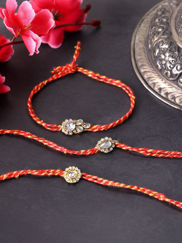 PANASH- Unisex Set Of 3 Gold Plated Stone Studded Thread Rakhis With Roli Chawal