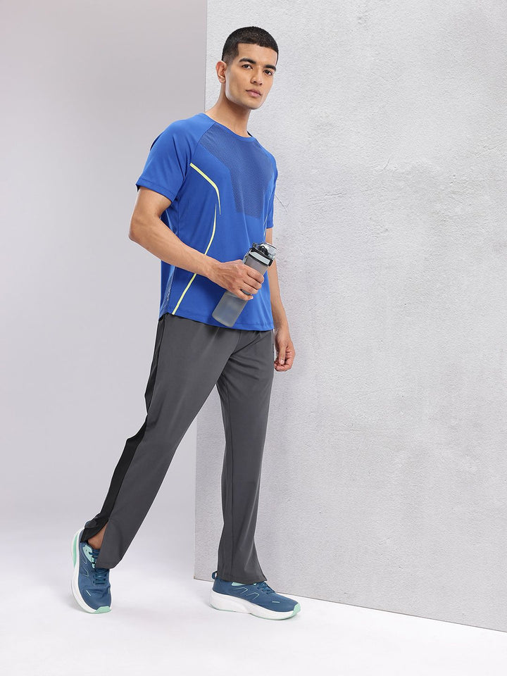 HRX by Hrithik Roshan Men Mid-Rise Rapid-Dry Training Track Pants with Side Stripes
