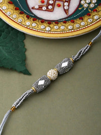 Voylla Unisex Silver Beaded and Pearls Rakhi with Roli Chaawal Pack