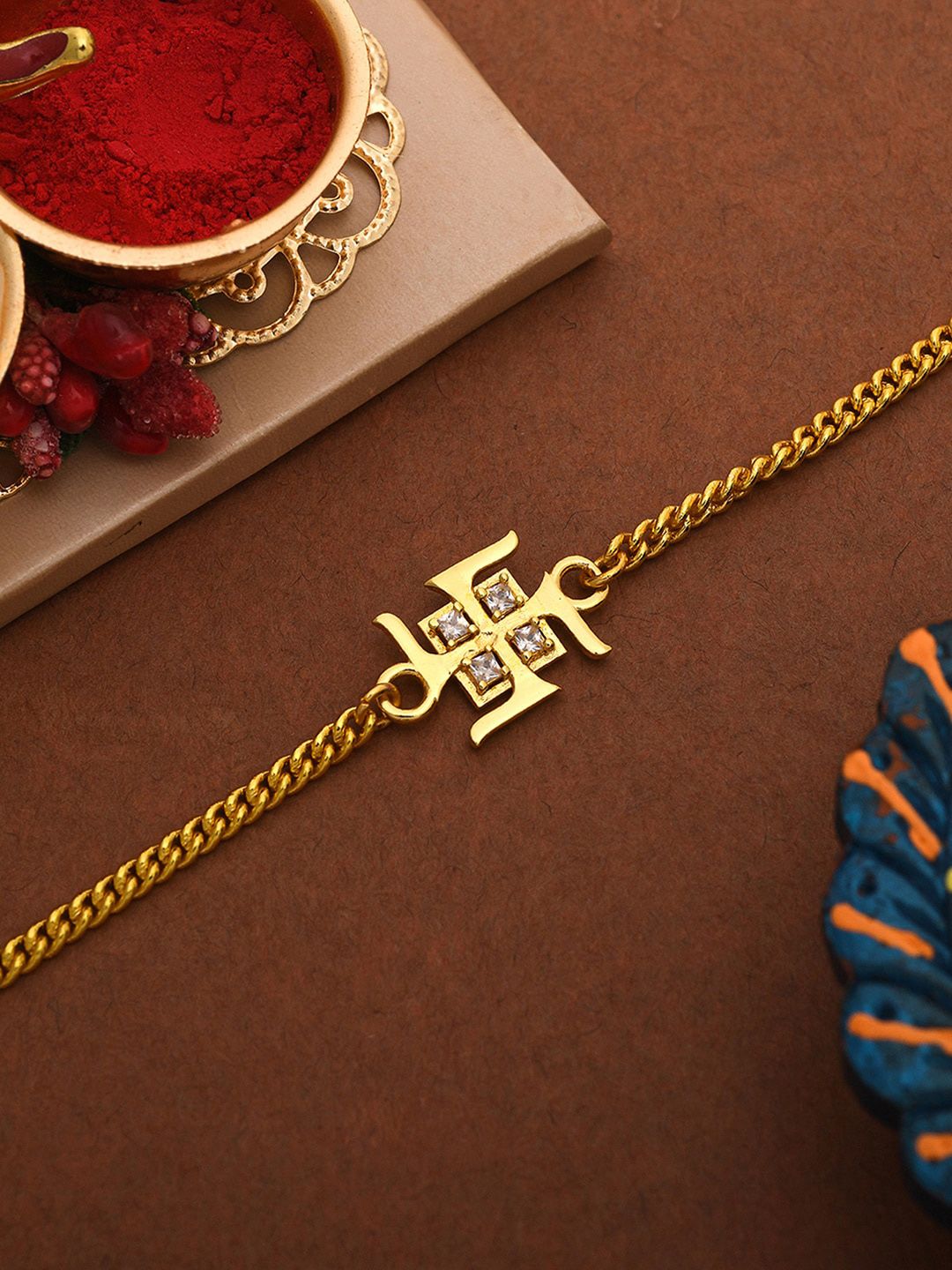 Voylla Gold Toned Auspicious Swastik Bracelet Style Rakhi