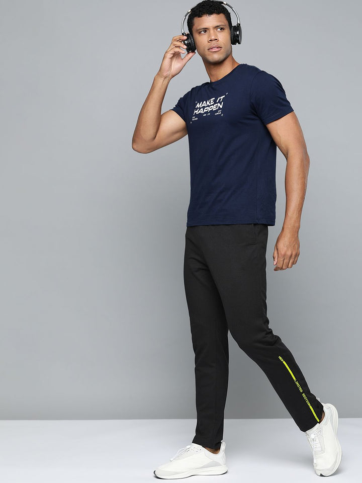 HRX by Hrithik Roshan Men Printed Detail Mid-Rise Regular Fit Lifestyle Trackpants
