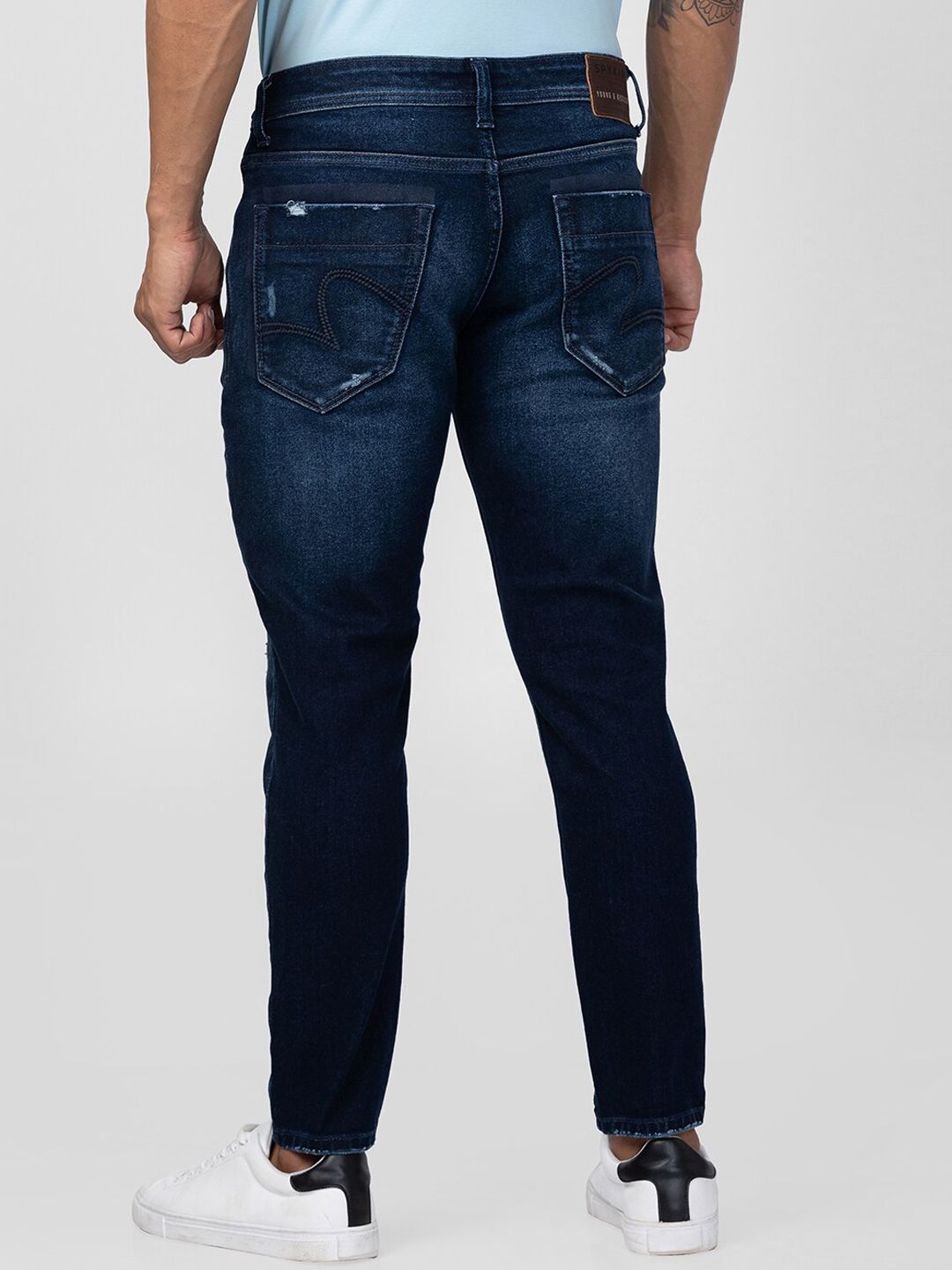 SPYKAR Men Tapered Fit Mildly Distressed Light Fade Stretchable Cotton Jeans