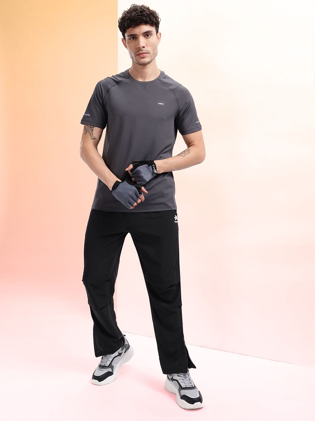 HRX by Hrithik Roshan Men Mid-Rise Rapid-Dry Training Track Pants with Side Slits
