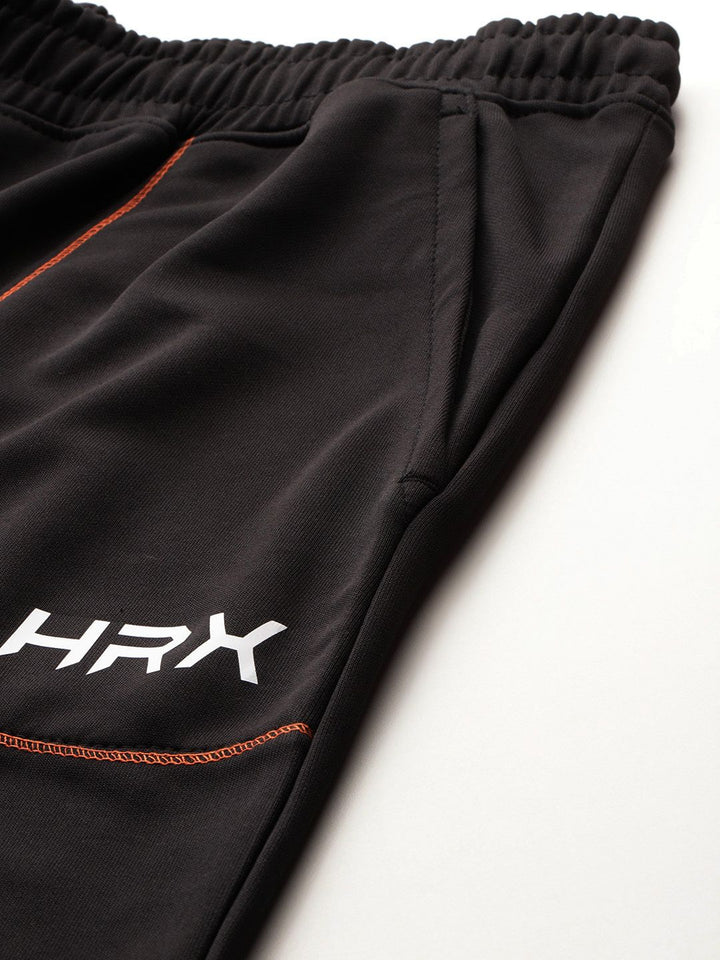 HRX by Hrithik Roshan Men Brand Logo Printed Detail Mid-Rise Rapid-Dry Training Joggers