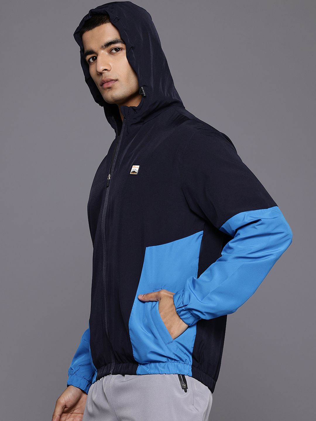 HRX by Hrithik Roshan Colourblocked Rapid-Dry Hooded Outdoor Jacket
