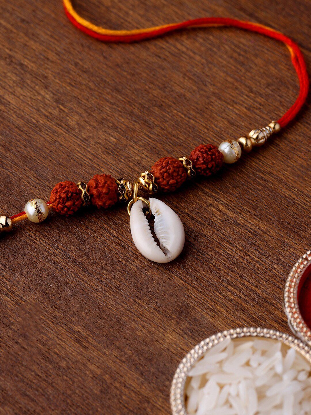 Voylla Divine Rudraksha Rakhi With Cowrie Shell