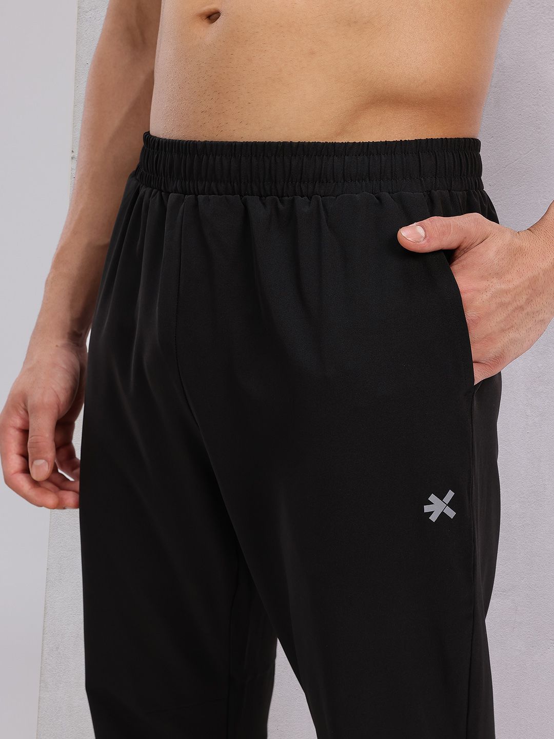 HRX by Hrithik Roshan Men Mid-Rise Rapid-Dry Running Track Pants