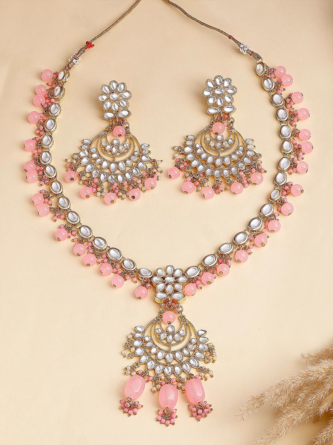 KARATCART Gold-Plated Pink & White Kundan Studded & Beaded Handcrafted Jewellery Set