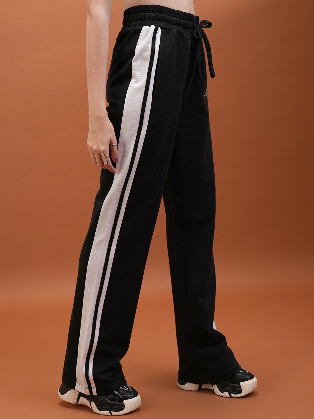 Tokyo Talkies Women Black Flared-Fit Mid Rise Track Pants