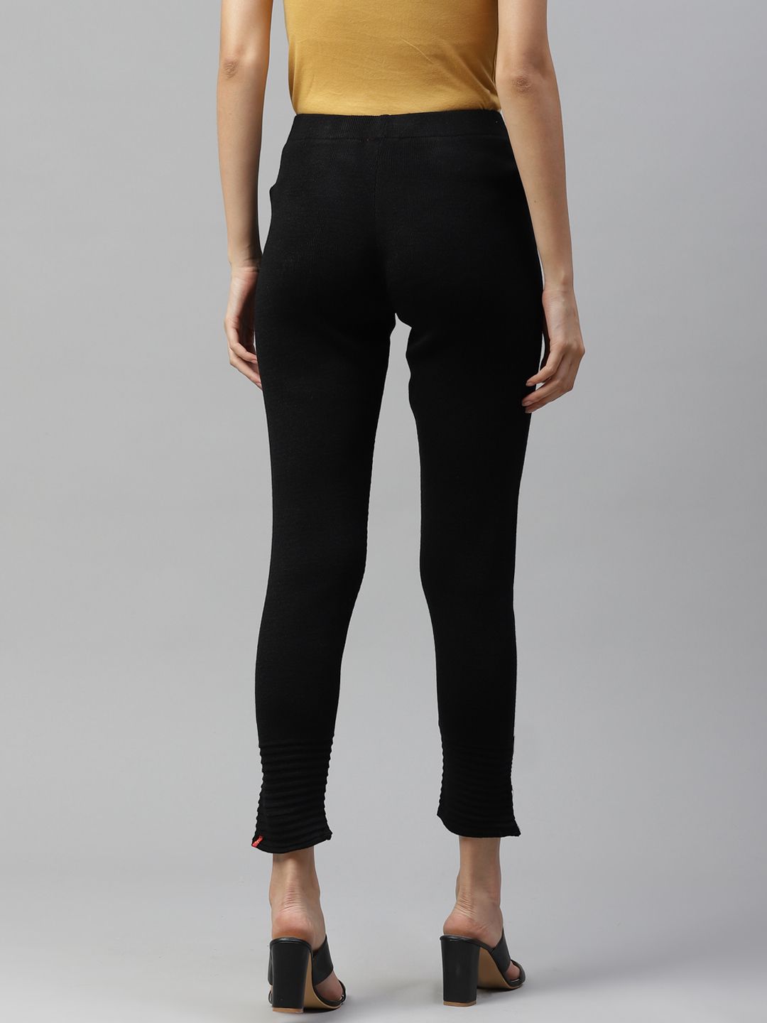 Women W Black Solid Cropped Leggings with Pintucked Hemline