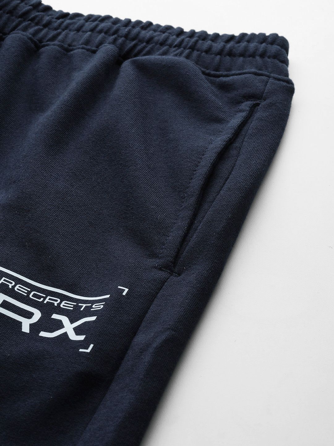 HRX by Hrithik Roshan Men Printed Detail Mid-Rise Regular Fit Lifestyle Trackpants