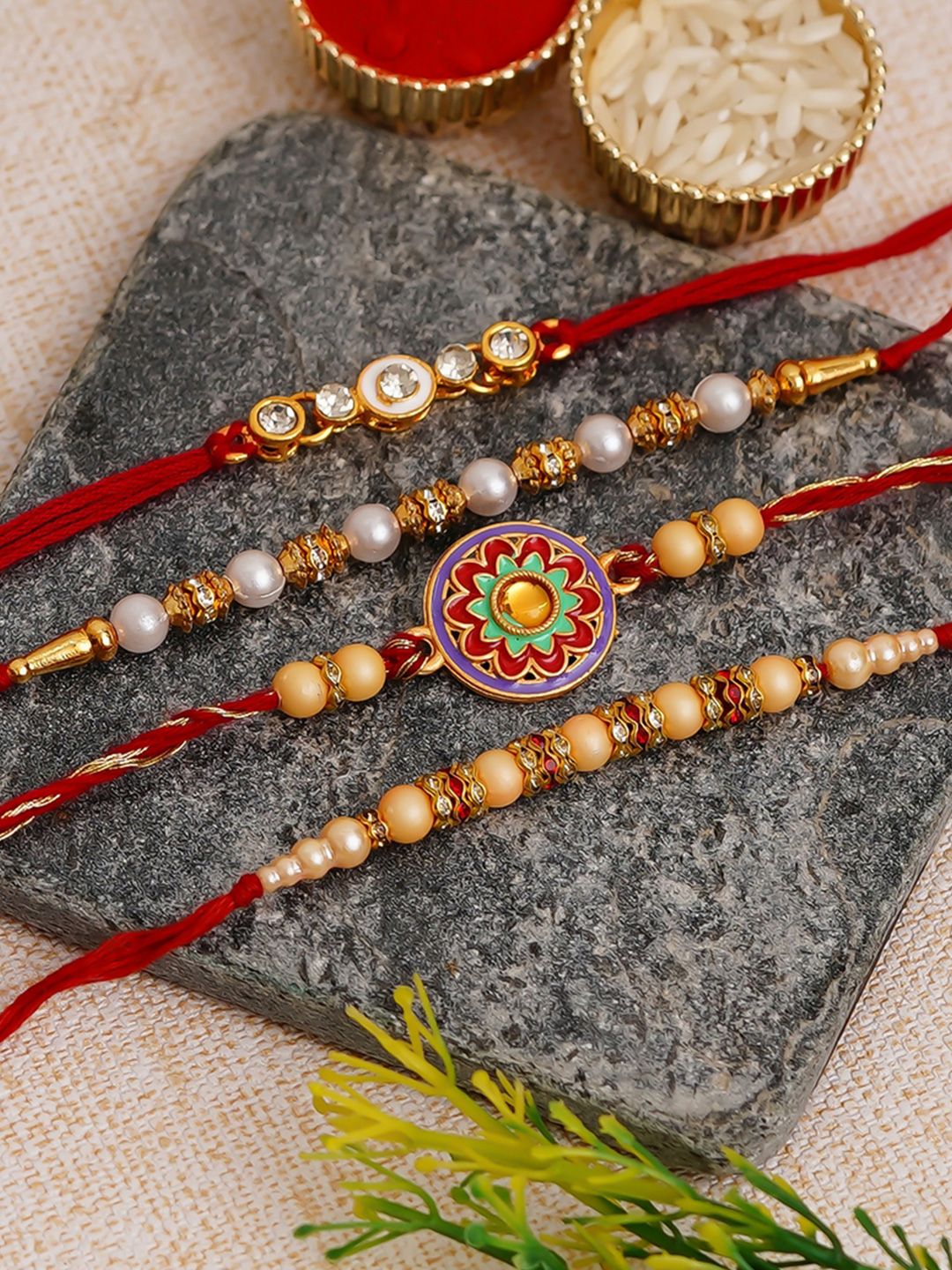 eCraftIndia Set of 4 Stones Studded & Pearls Beaded Thread Rakhis With Ferrero Rocher