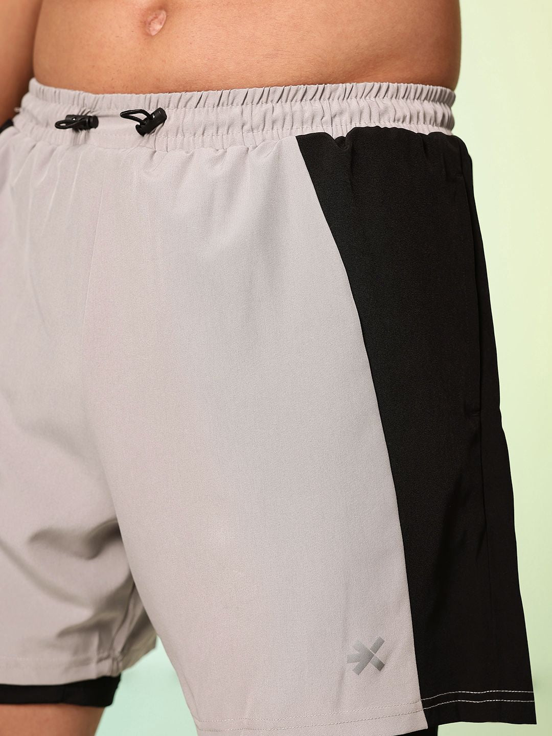 HRX by Hrithik Roshan Men Colourblocked Running Sports Shorts with Attached Tights