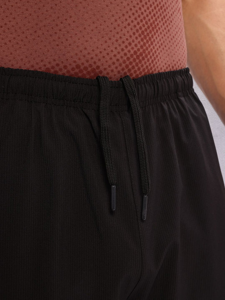 HRX by Hrithik Roshan Men Mid-Rise Rapid-Dry Lifestyle Track Pants