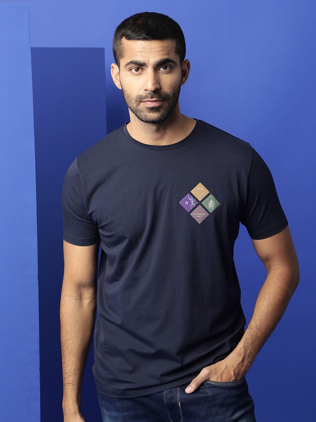 RARE RABBIT Men Badget Printed Slim Fit Cotton T-Shirt