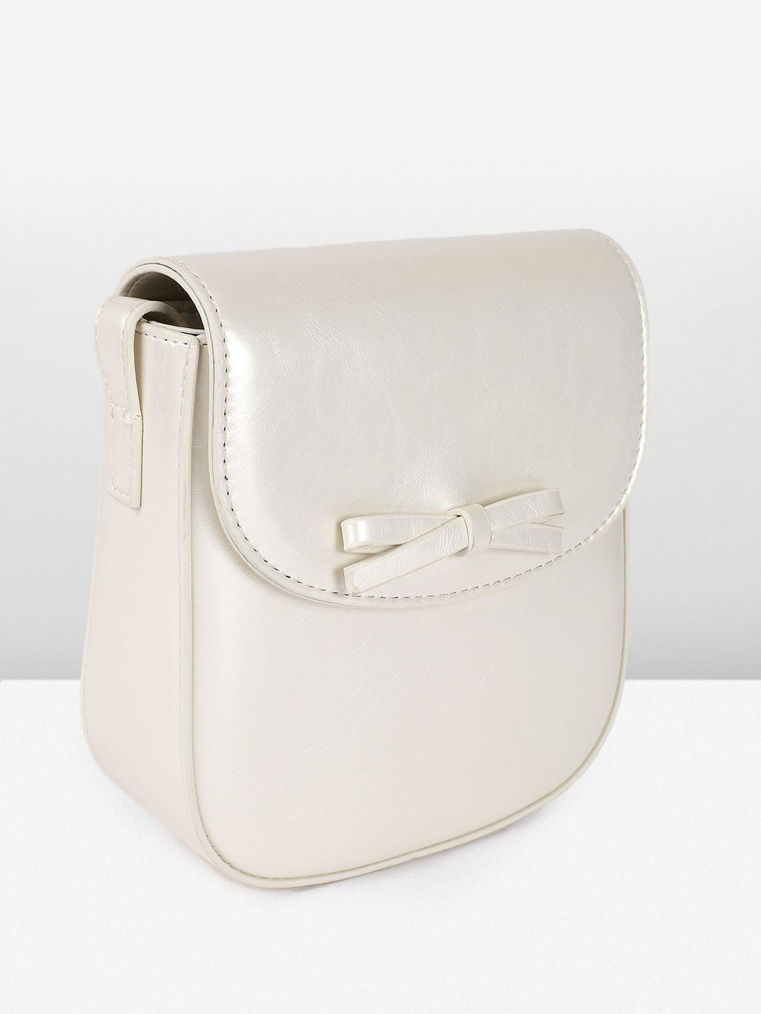 DressBerry Textured Structured Sling Bag with Bow Detail