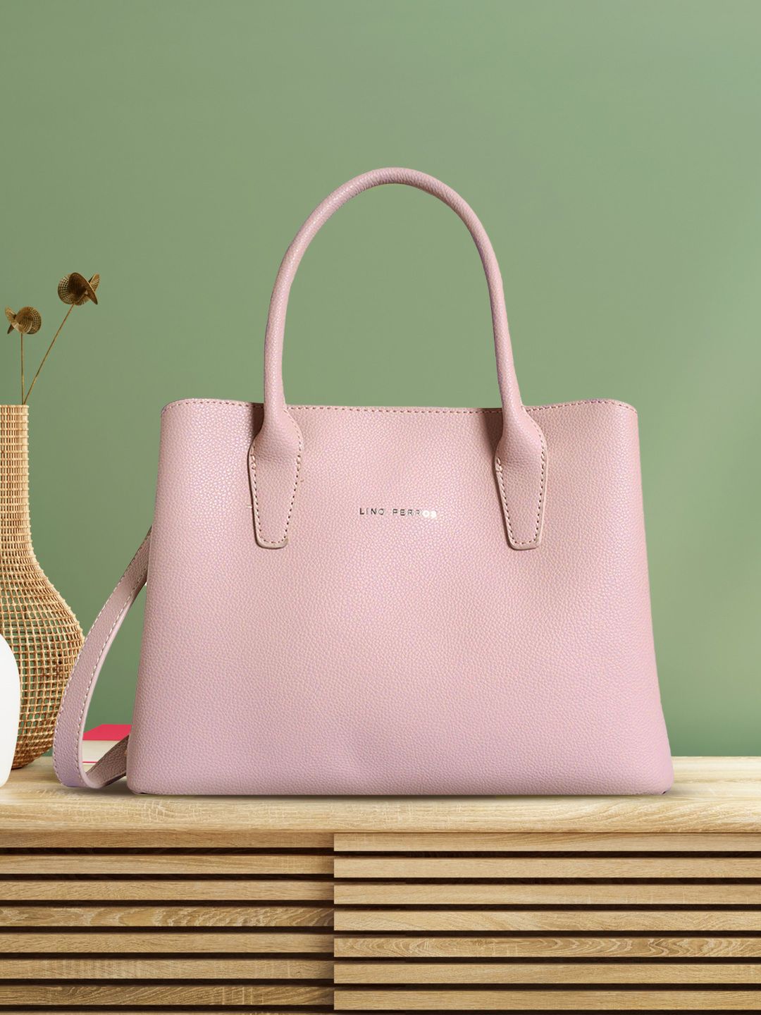 Lino Perros Pink Solid Handheld Bag
