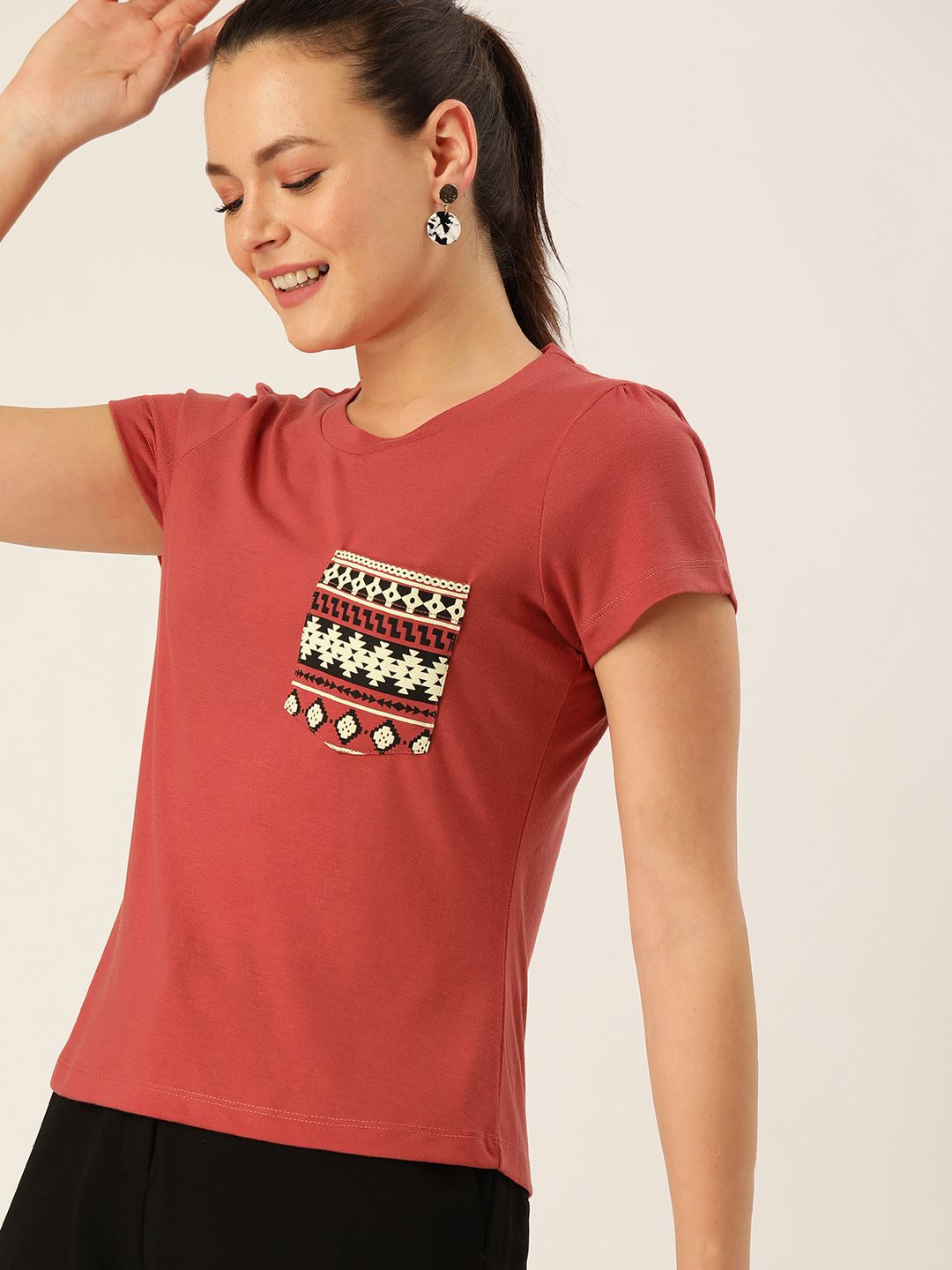 DressBerry Women Coral Red Solid Round Neck T-shirt With Detailed Pocket