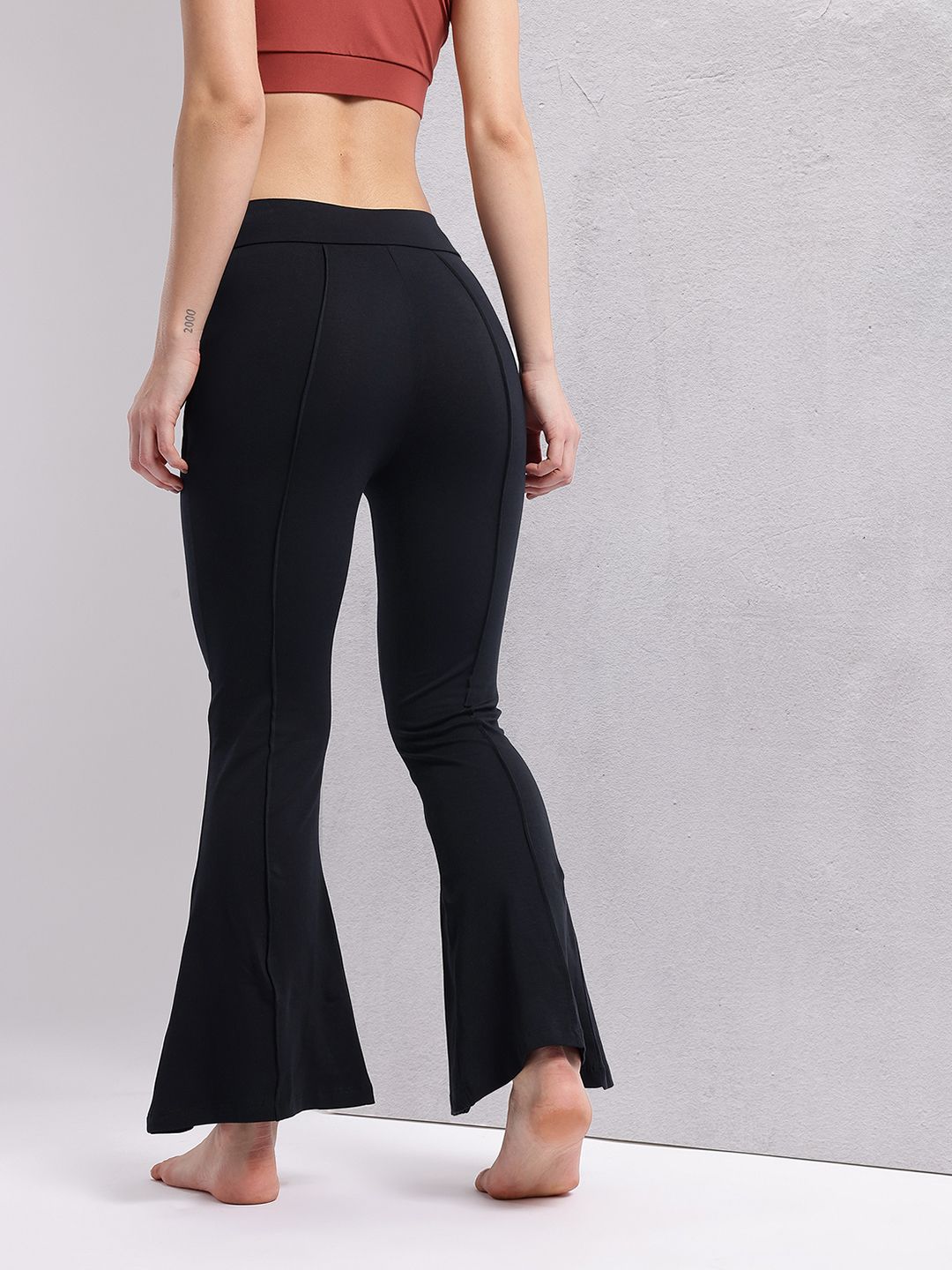 HRX by Hrithik Roshan Women Slit Hem Paneled Flared Yoga Track Pants