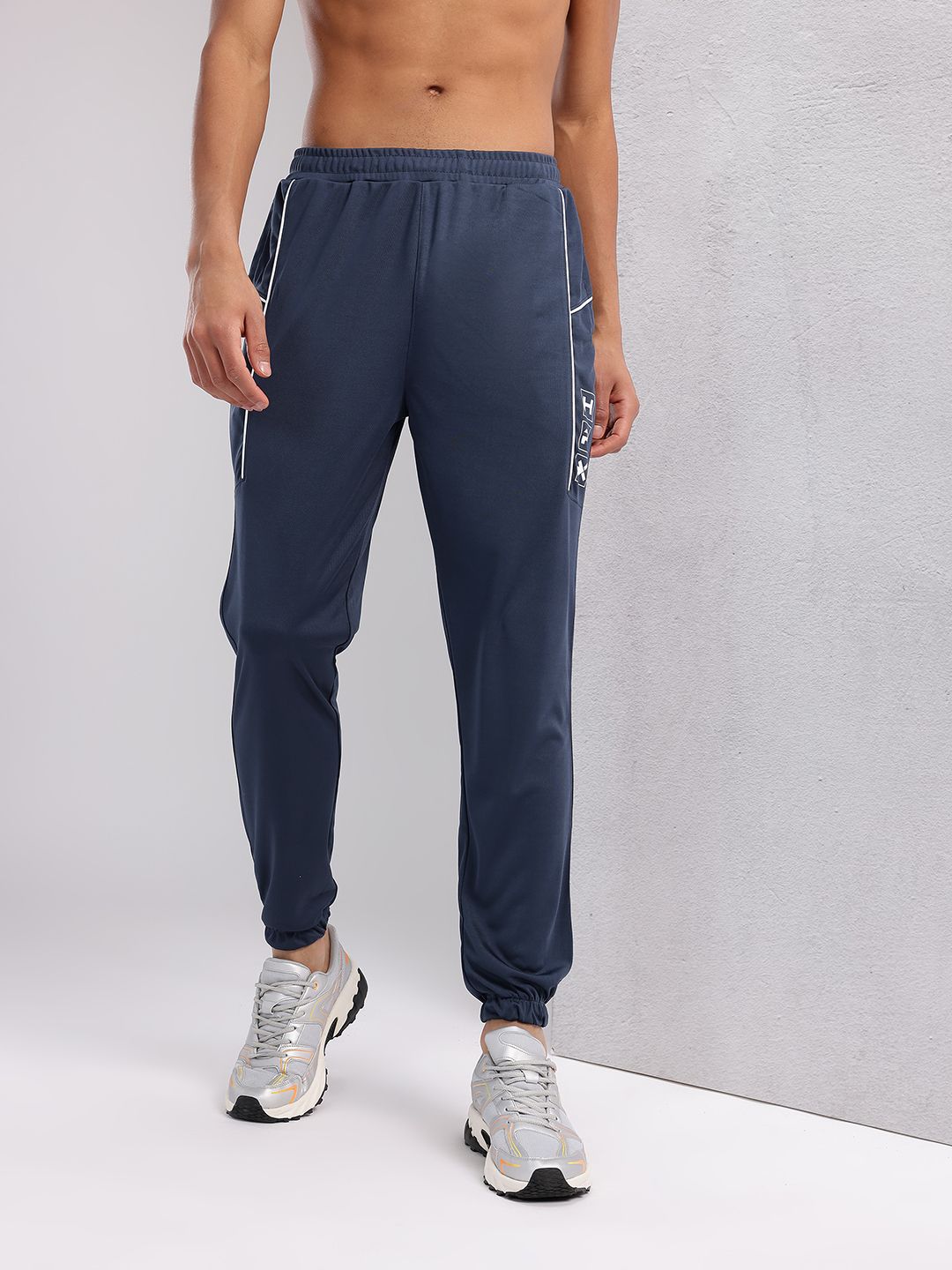 HRX by Hrithik Roshan Men Brand Logo Printed Mid-Rise Rapid-Dry Training Joggers
