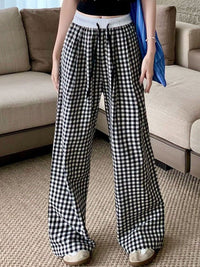 Wanita Dressberry memeriksa seluar kaki lebar longgar pertengahan