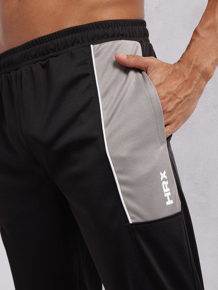 HRX by Hrithik Roshan Men Colourblocked Detail Mid-Rise Rapid-Dry Joggers