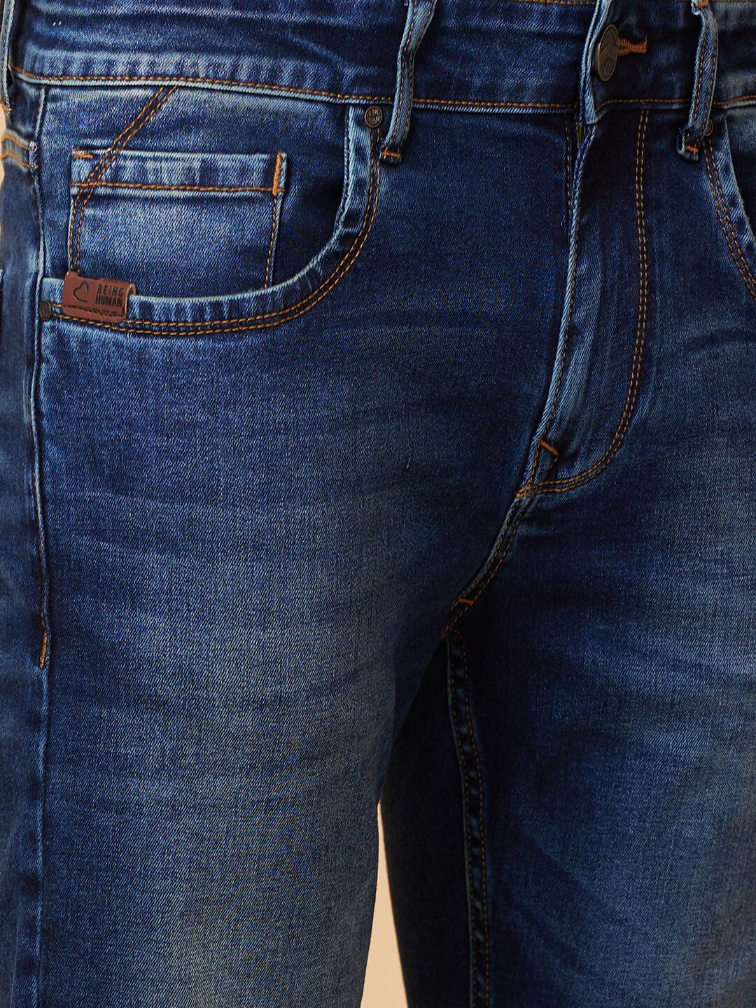 Being Human Men Skinny Fit Mid Rise Low Distress Heavy Fade Jeans
