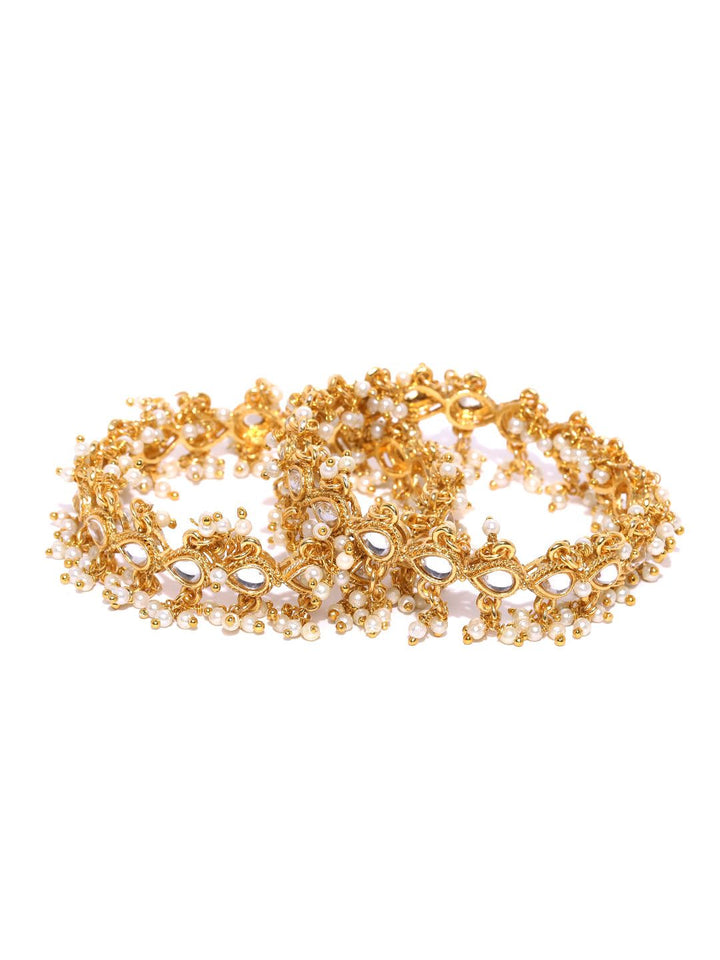 Set priyaasi dari 2 gegelung buatan tangan Kundan yang berlapis emas