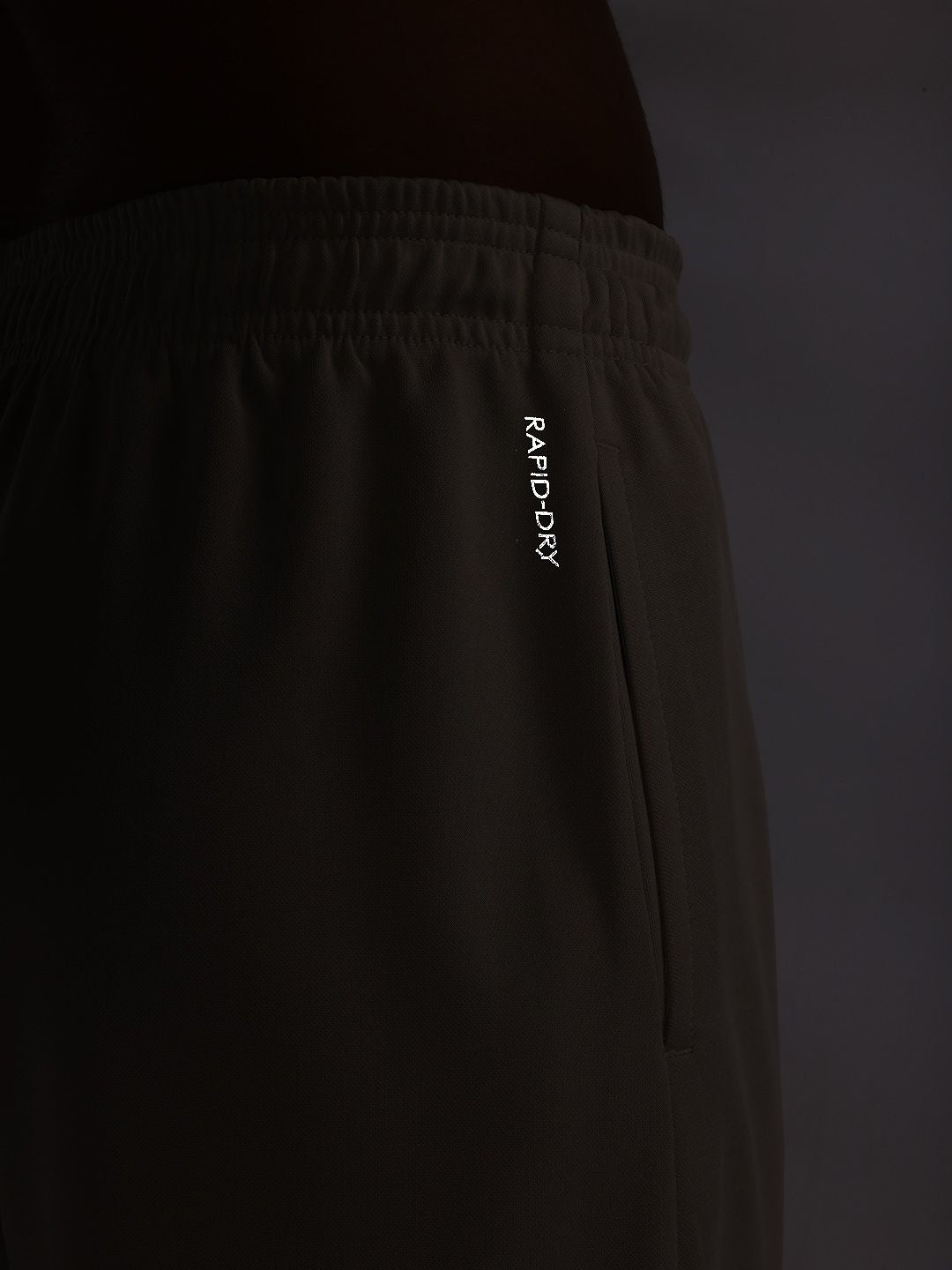 HRX by Hrithik Roshan Men Mid-Rise Rapid-Dry Running Track Pants with Side Taping Detail