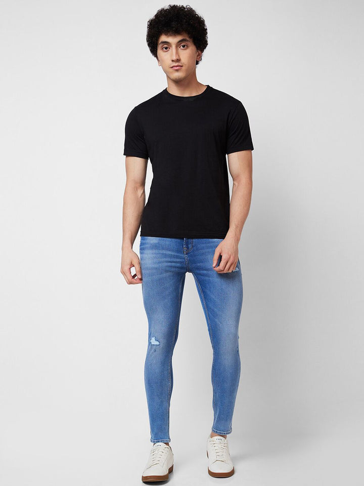 SPYKAR Men Tapered Fit Mildly Distressed Heavy Fade Whiskers Cotton Jeans