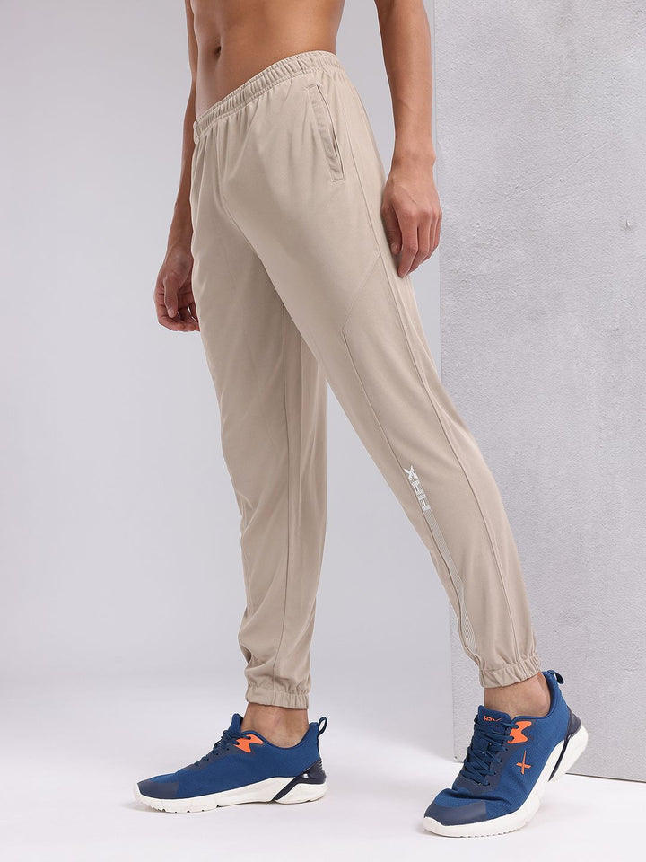 HRX by Hrithik Roshan Men Mid-Rise Brand Logo Detail Rapid-Dry Training Joggers