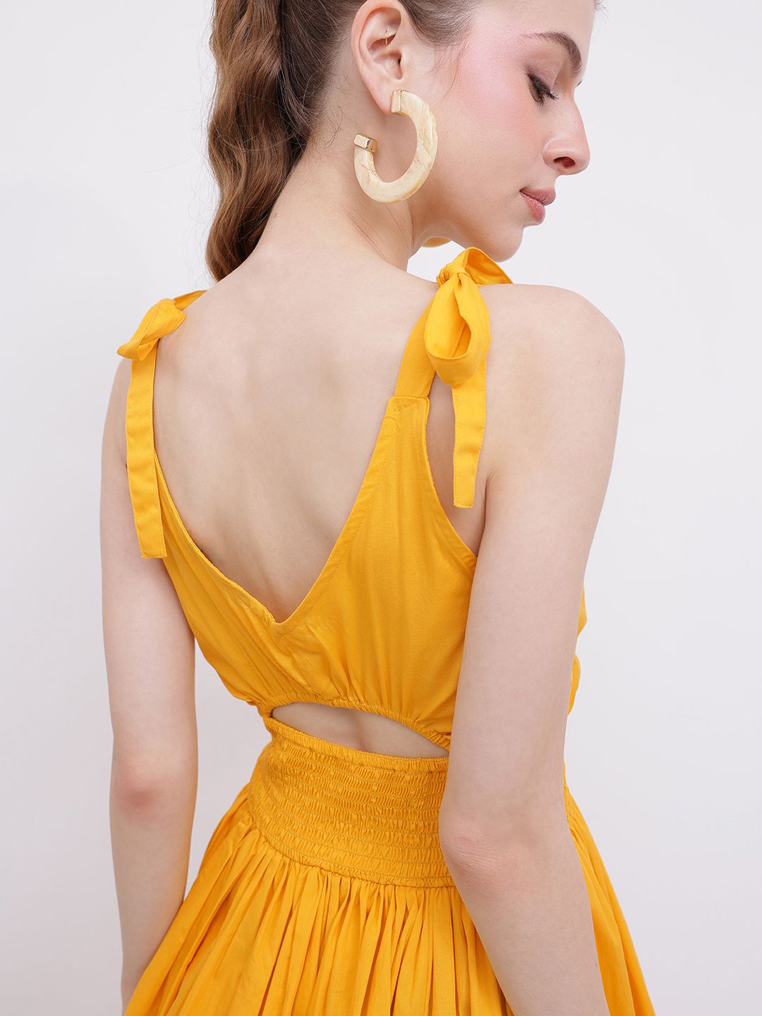 DressBerry Flattering Charm Cinched Smocked Waist Cut-Outs Bow Detailed A-line Mini Dress