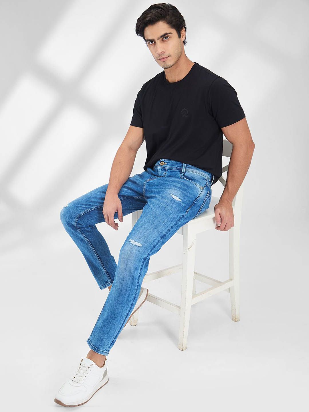 SPYKAR Men Slim Fit Mildly Distressed Light Fade Stretchable Jeans